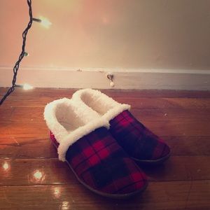 Tom’s red plaid slippers